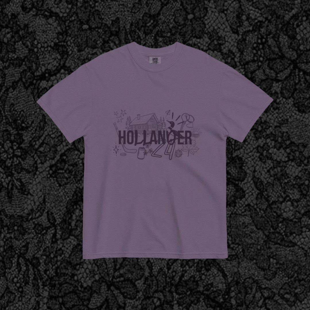 Purple t-shirt with text on a black textured background