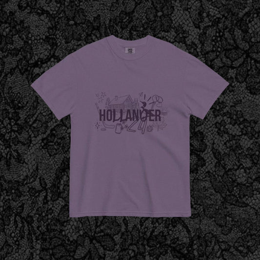 Purple t-shirt with text on a black textured background